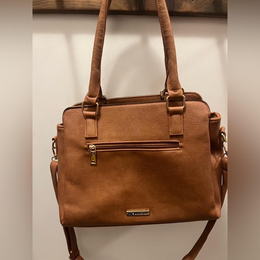Brown purse with gold hardware